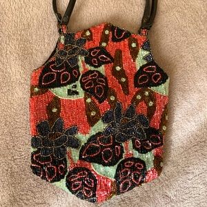 Sequined wristlet bag by Jamin Puech